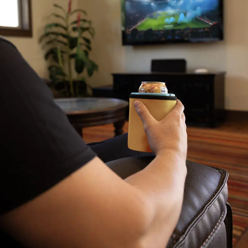Man using iCube Wrapsulator regular orange while watching tv